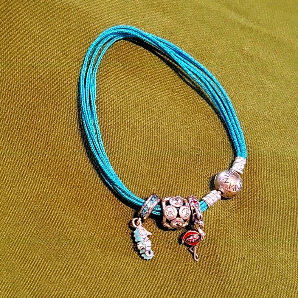 Pandora multistrand turquoise bracelet with 3 charms
